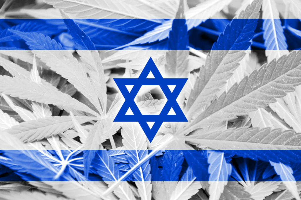 Israel flag on cannabis background